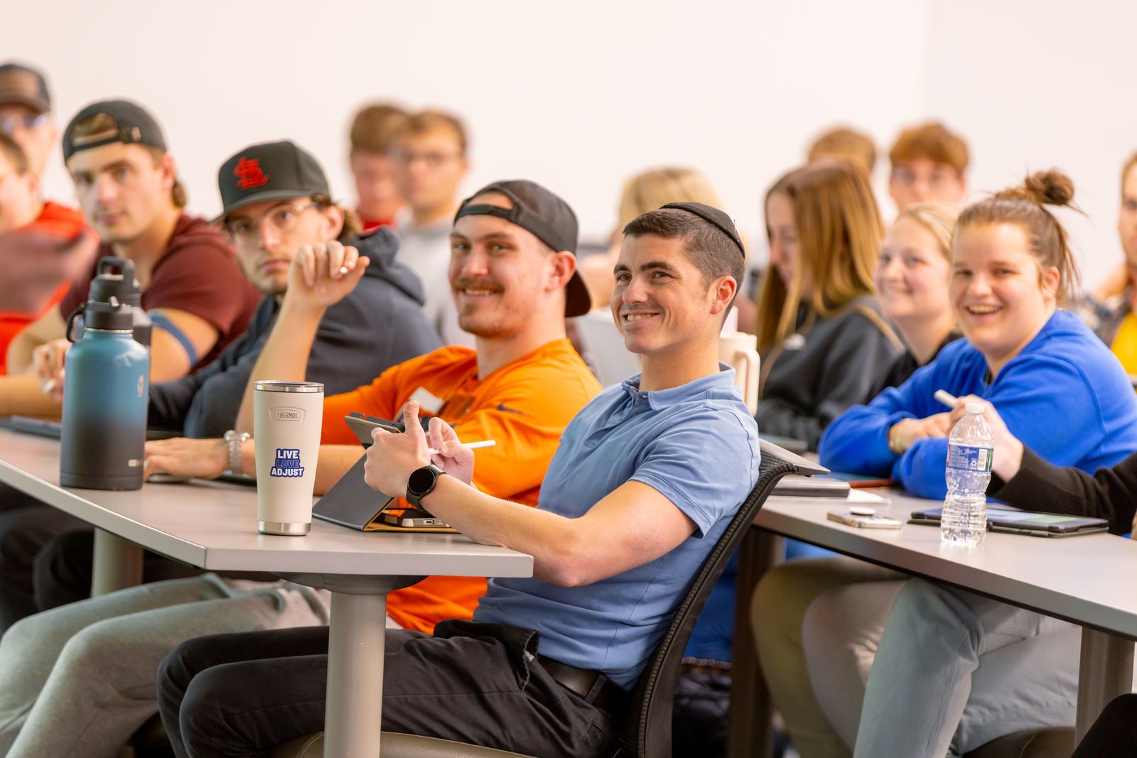 Doctor of Chiropractic students practicing technique at Logan University